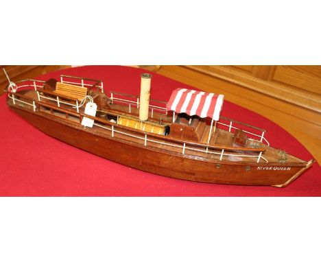 A wooden scale model of an African style steam driven River Boat. Named "RIVER QUEEN", 0verall length 97cm with a maximum bea