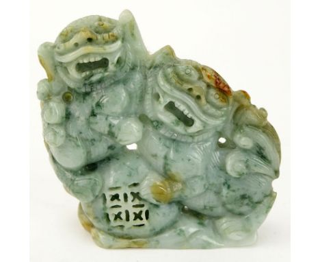 Chinese Carved Jade Carving of Two Foo Lions. Light to dark green with splashes of amber color. Natural wear or else good con