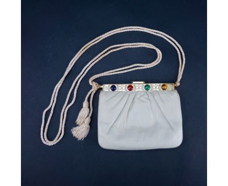 Judith Leiber Beige Leather Handbag With Cabochon Accents. Gold-tone hardware. Braided silk straps with tassels. Light soilin