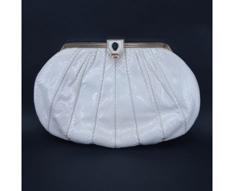 Vintage Judith Leiber White Snakeskin Handbag With Intaglio Closure. Gold-tone hardware. Optional leather strap. Labeled. Lig