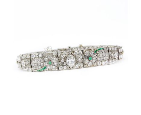 Art Deco Approx. 5.70 Carat Diamond, Emerald and Platinum Bracelet. Set in the center with an approx. .70 carat marquise cut 