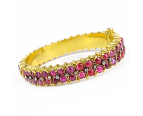 Approx. 22.50 Carat Cabochon Ruby, 1.0 Carat Rose Cut Diamond and 22 Karat Yellow Gold Hinged Bangle Bracelet. Rubies with vi