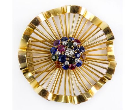 Retro 18 Karat Yellow Gold Pinwheel Brooch set with Approx. .50 Carat Old Mine Cut Diamond and Multi Color Gemstones. Diamond