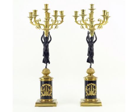 Pair of Empire Style Parcel Gilt Bronze Five Arm Candelabra. Unsigned. Rubbing and light patina. Measures 25-1/2" H x 10" W. 