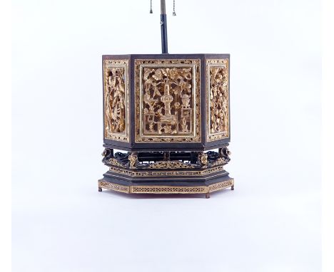 19/20th Century Chinese Carved Giltwood and Black Painted 6 Side Table Lamp. Raised relief panels of various scenes comprisin