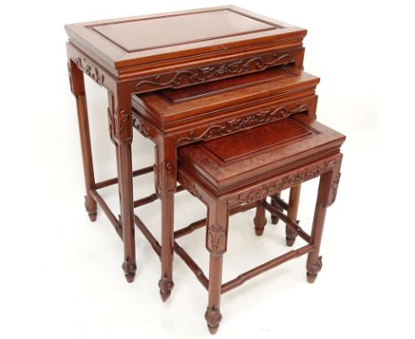 Vintage Chinese Carved Hardwood Nesting Tables. This group of 3 are decorated with inlay and carved legs and aprons. Unsigned