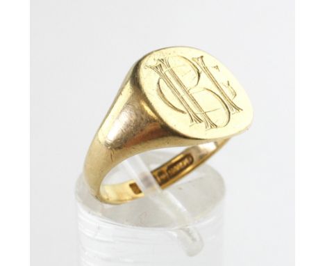 A yellow metal signet ring with personal inscription. Size M Hallmarked 18ct gold, Birmingham 7.2 grams