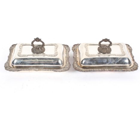 A pair of Victorian silver-plated crested shaped rectangular vegetable dishes and covers, cast with shells and flowers within