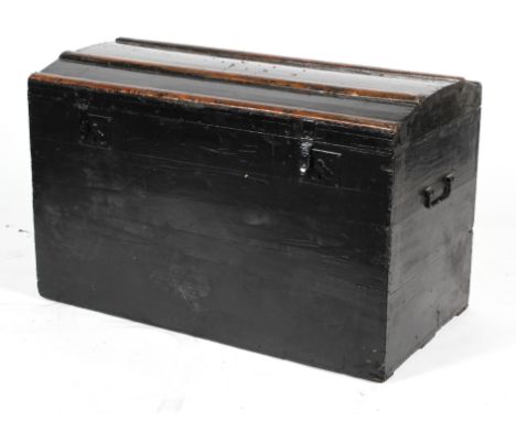 A 19th century ebonised domed top travelling trunk, the top with coopering, 98 cm wide x 62 cm high x 51.5 cm deep 