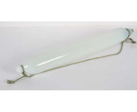 A large Nailsea-type milk glass rolling pin, late 19th century, with cork stopper, 79 cm long 