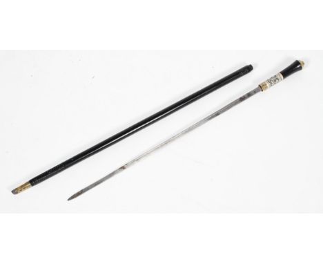 An early 20th century swordstick, with brass lion mask cap and carved foliate bone handle,92 cm long 