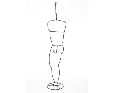 A 1980's vintage Laudris Lonborg valet mannequin stand, constructed in ebonised metal in the form of a male silhouette, 189cm