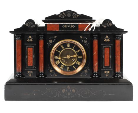 A Victorian slate mantle clock, late 19th century, of architectural temple form, with black and brass dial, engraved and gilt