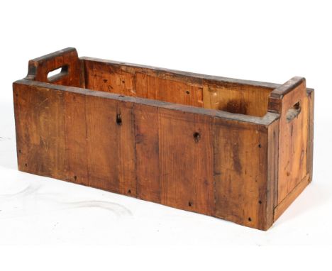 A pine two-handled rectangular trunk, 41 cm high x 101 cm wide x 39 cm deep 