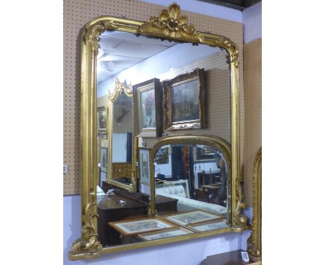 A large 20th century giltwood overmantle mirror, with C-scroll and shell finial, 152 x 120cm 