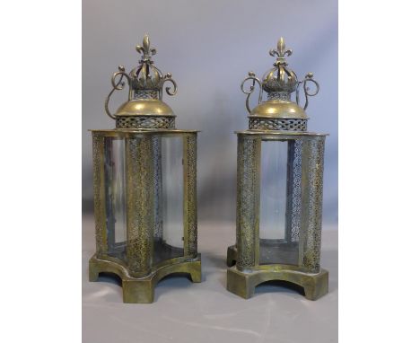 A pair of contemporary storm lanterns, with crown finial, H.70cm 
