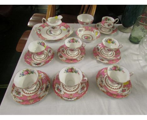 ROYAL ALBERT LADY CARLYLE TEA SERVICE COMPRISING CUPS, SAUCERS AND TWO CAKE PLATES.