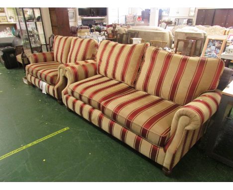 ALSTONS AMBERLEY PALE GOLD AND RED STRIPED UPHOLSTERED LARGE TWO SEATER SOFA AND MATCHING SMALLER TWO SEATER SOFA ON WOODED F