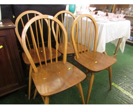 SET OF FOUR ERCOL LIGHT ELM STICKBACK DINING CHAIRS.