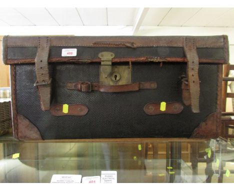 Vintage leather clad travel case with painted initials. As found.
