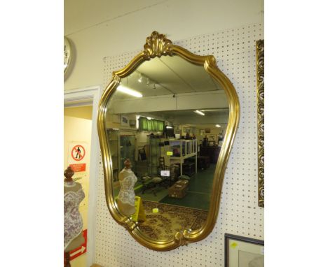 REPRODUCTION GILT FRAMED CARTOUCHE SHAPED WALL MIRROR