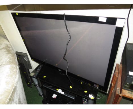 LG 41 INCH TELEVISION WITH REMOTE AND WALL BRACKET