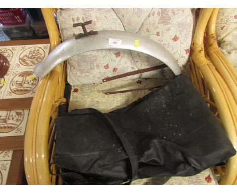 Vintage aluminium motorcycle mudguard, and a pair of Belstaff black riding trousers