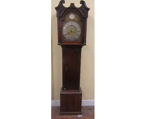 Georgian oak longcase clock, the hood with column supports and swan neck pediment enclosing a broken arch brass dial with sil