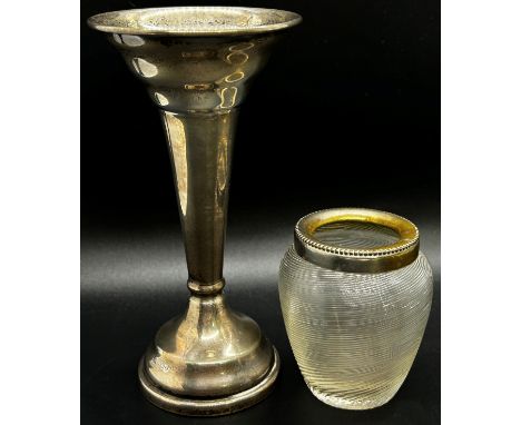 A silver posy vase, three spoons and a fork, together with a glass bon bon dish on a silver spread foot and a glass match str