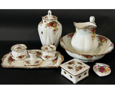 Royal Albert Country Roses ceramics to include basin &amp; ewer, lidded urn, dressing table set etc. 