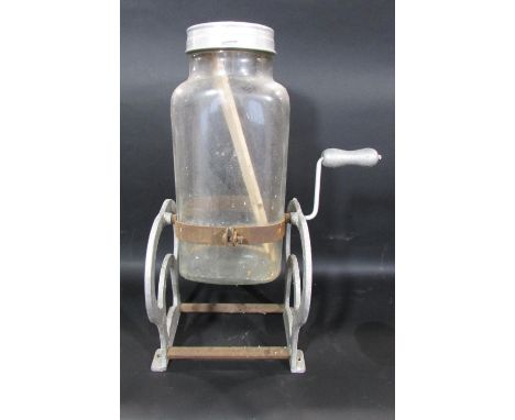 A vintage hand turned butter churn. 