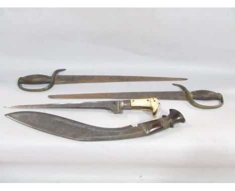 A South East Asian long bladed dagger with a bone handle, 42cm long, a pair of flat handled knives with a wooden grip and bra