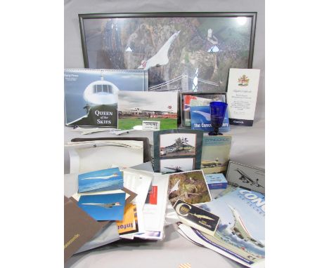 Concorde ephemera including six framed photos/ illustrations, calendars, tickets, on board flight mementos, a crew training m