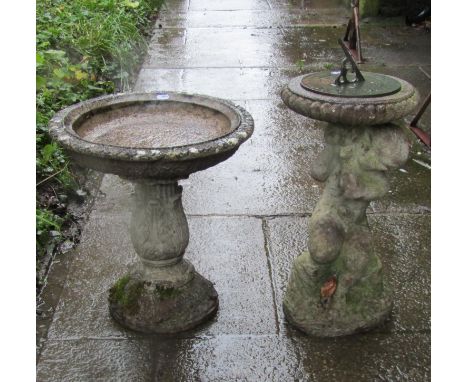 Small weathered cast composition stone bird bath, with circular top and acanthus leaf detail, 41cm diameter x 44cm high, toge