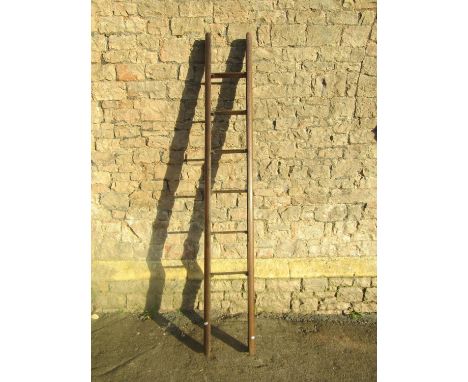 A rustic antique oak folding 6-run library ladder, 227cm 