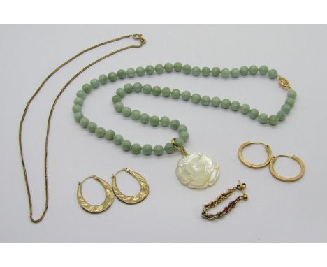 Modern 14k jade bead necklace, hung with a 14k carved mother of pearl flower pendant, together with a 9ct chain necklace and 