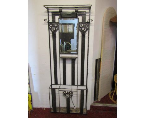 Manner of Edgar Brant - an Art Deco style metal framed hallstand, the open vertical slatted frame with hammered and simple sc