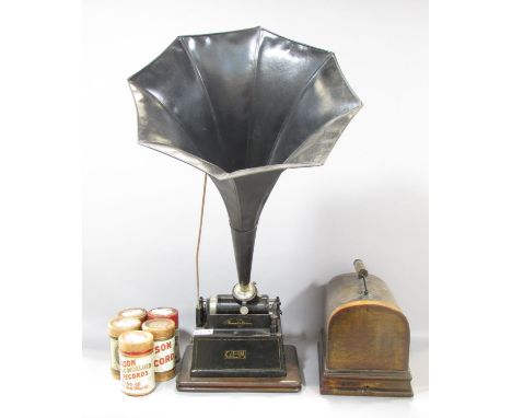 An Eddison Gem phonograph with removable octagonal trumpet in its original domed case, requires a crank key, together with fi