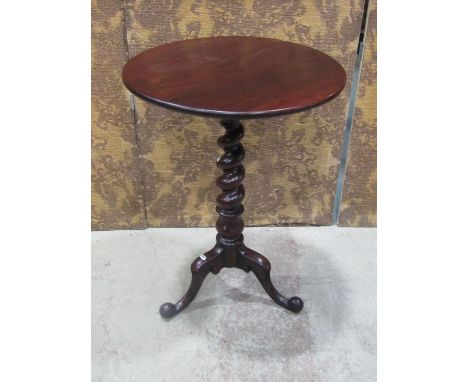 A Victorian mahogany occasional table, the circular top raised on a spiral twist pillar and scrolled tripod, 72 cm high x 51 