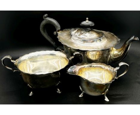 A three piece silver tea service, Birmingham 1902, maker Barker Brothers Silver Limited, 17.5 ozs approximately 