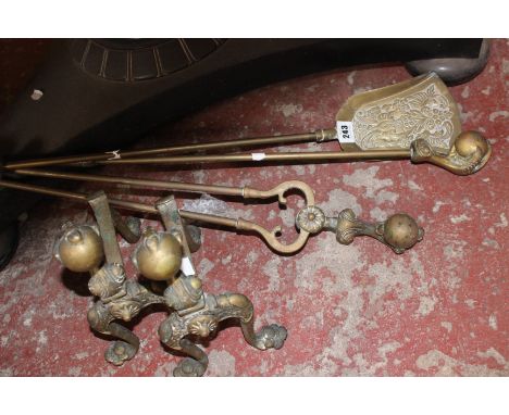 Brass fire tools and a pair of andirons 