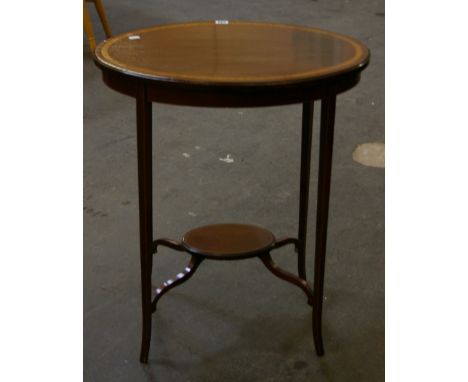 An Edwardian mahogany and inlaid oval table 63cm wide and a  pine hanging three tier shelf with turned supports 