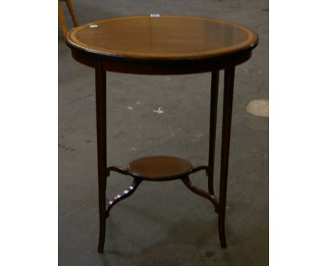 An Edwardian mahogany and inlaid oval table 63cm wide and a  pine hanging three tier shelf with turned supports 