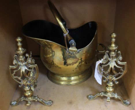 A brass coal scuttle, a pair of brass andirons, late 19th century and a fire screen