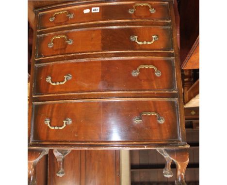 A reproduction chest of drawers, small ottoman, a bedside cabinet and a pair of side chairs, a fire screen and a long mirror