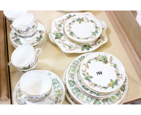 A Minton and Wedgwood part dinner and tea service decorated with vines
