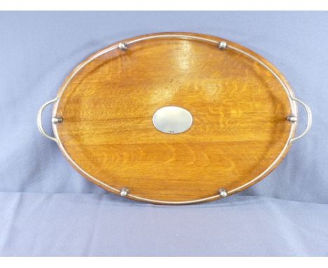 VINTAGE OVAL OAK TRAY, twin handled gallery and plated mounts, 62.5cms wide