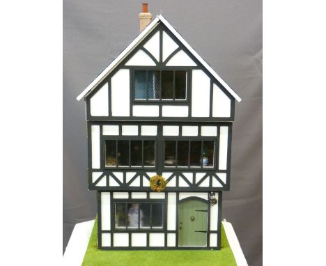 THE TUDOR HOUSE - a three storey building under a slate roof, fully furnished in period style, furniture, fixtures and fittin