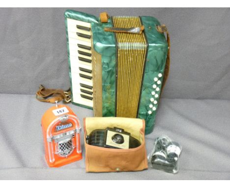 HOHNER MIGNON II ACCORDION, a Kodak Brownie 127, a Dime portable radio and a McDougal Flour Fred salt and pepper set