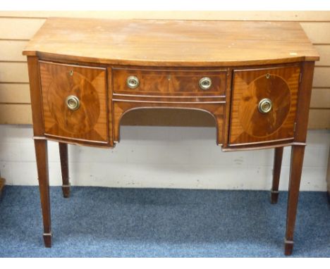 REGENCY STYLE, COMPACT BOW FRONTED SIDEBOARD on spade feet and tapered supports, 86cms height, 107cms width, 58cms depth